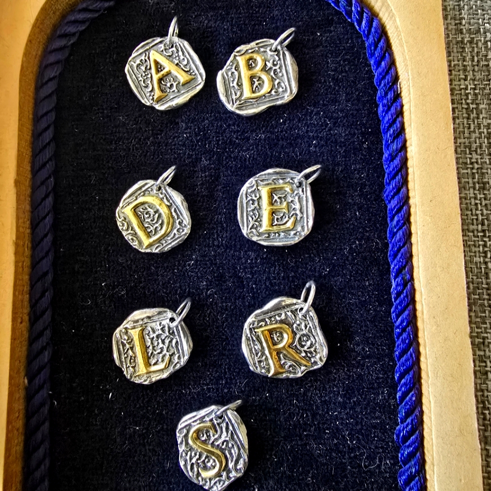 Silver And Gold Initial Charms 38$